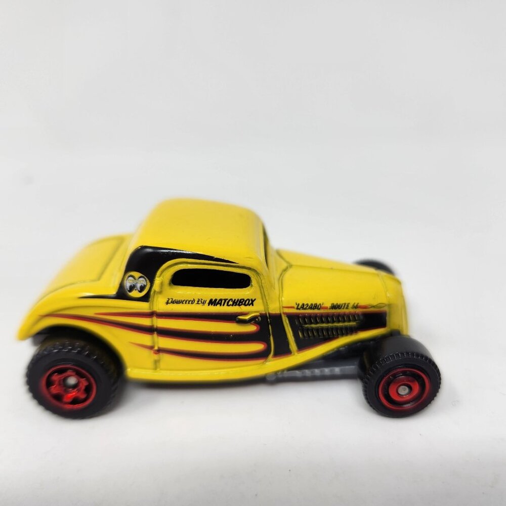 Matchbox 1933 Ford Coupe Die-Cast Model Car Yellow With Black & Red Flame Design